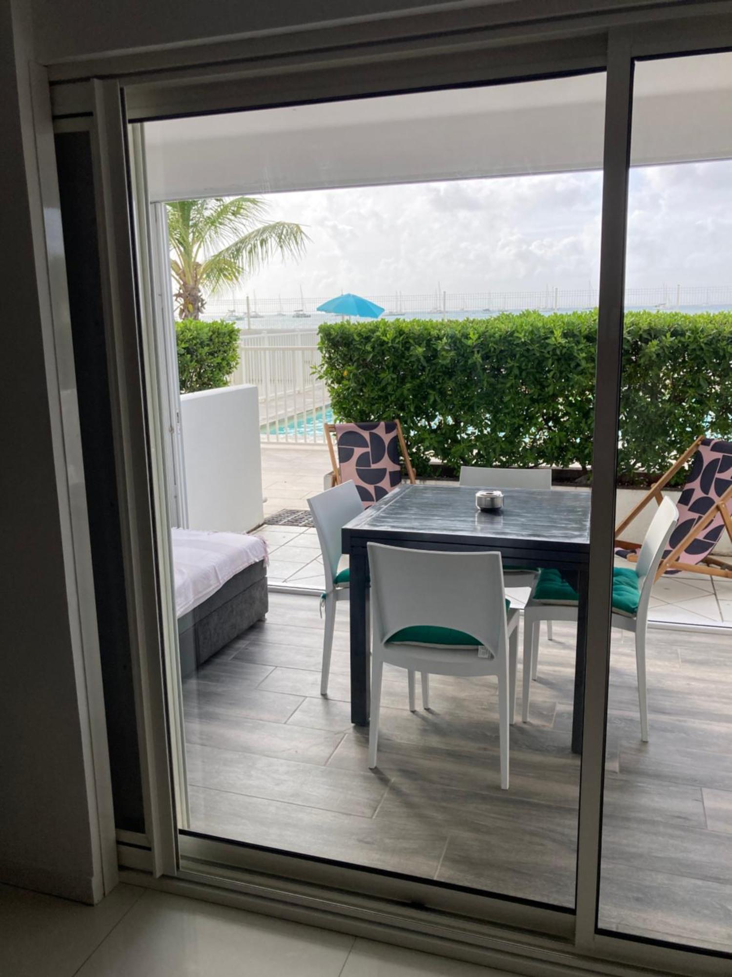 Appartement Pieds Dans L'Eau Vue Mer Acces Plage Et Piscine Marigot  Exterior photo